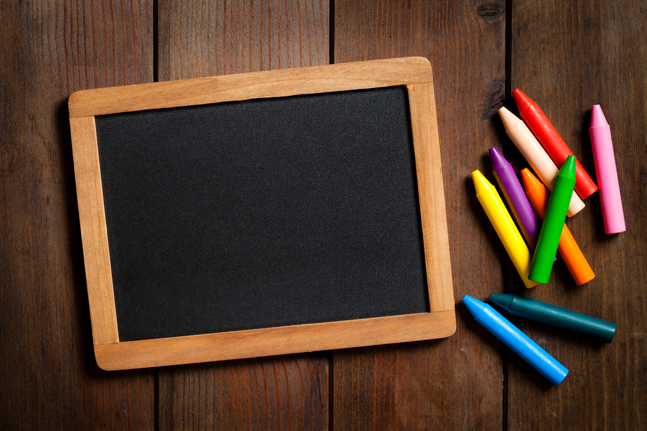 Blackboard and crayons
